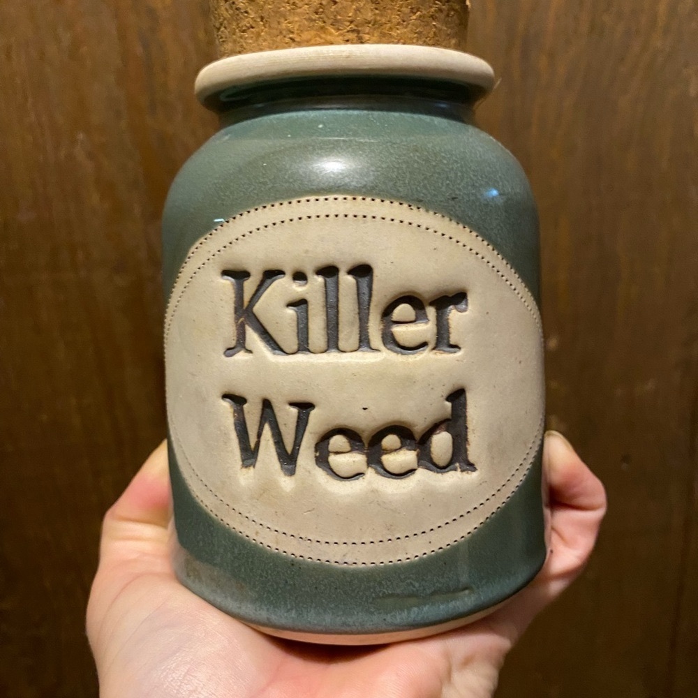 Ceramic storage container jar with cork top. Brophy’s Word Jars 1991